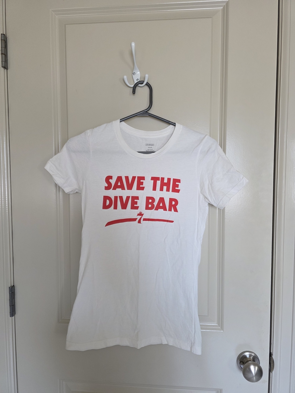 Women’s White Graphic Tee – Save The Dive Bar